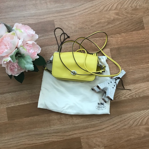 Coach Handbags - Coach penny leather crossbody bag in bright yellow